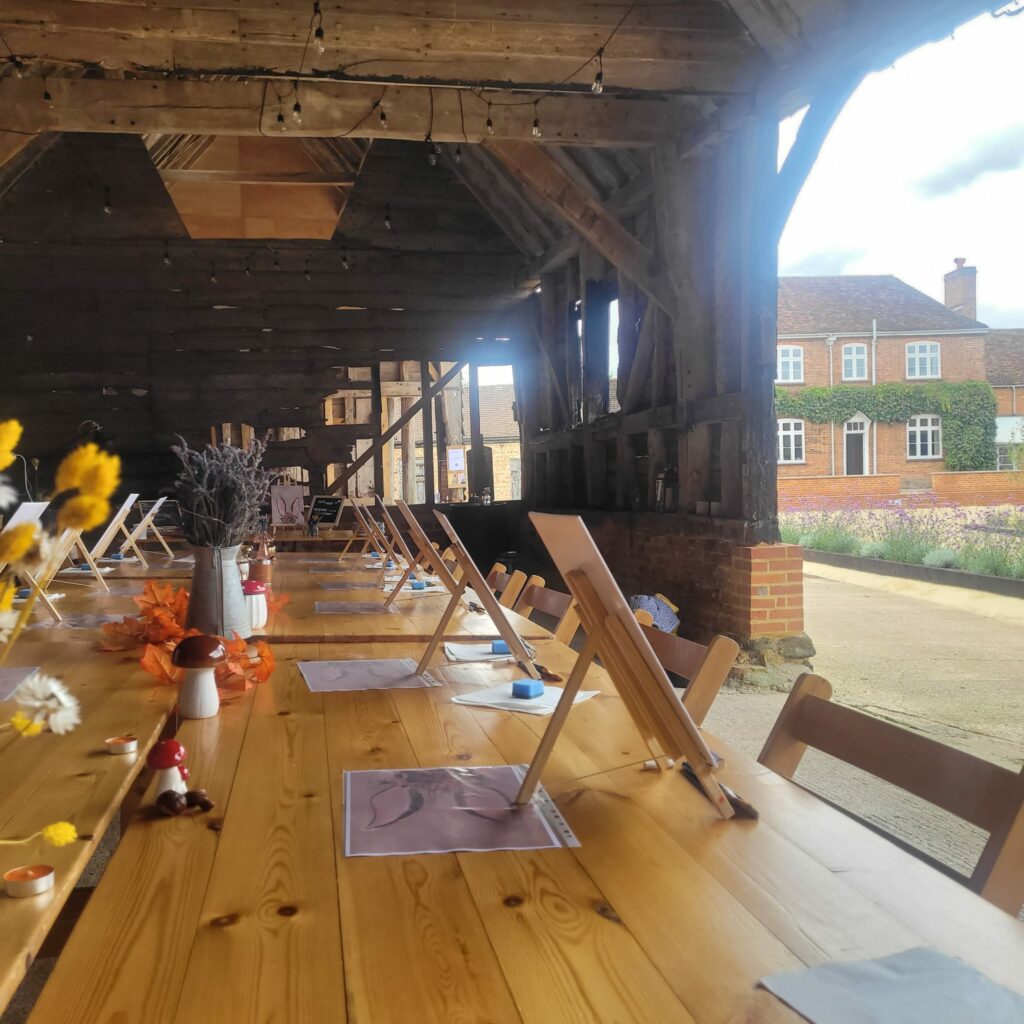 A view of the farmhouse at a painting workshop retreat afternoon at The Barns